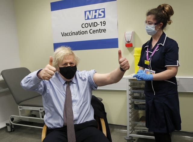 Prime Minister Boris Johnson gives the thumbs up after receiving the first dose of AstraZeneca vaccine (Frank Augstein/PA)