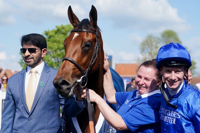 Trainer Saeed bin Suroor (left) and Jockey Oisin Murphy (right) celebrate with Mawj after winning the 1000 Guineas