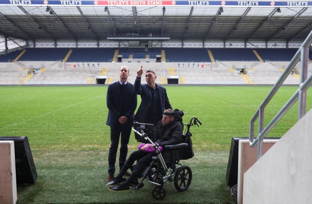 William (left) meets Rob Burrow (right) and Kevin Sinfield during a visit to Headingley Stadium in Leeds in 2024