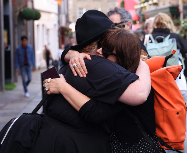 A hug shared by fans in Temple Bar