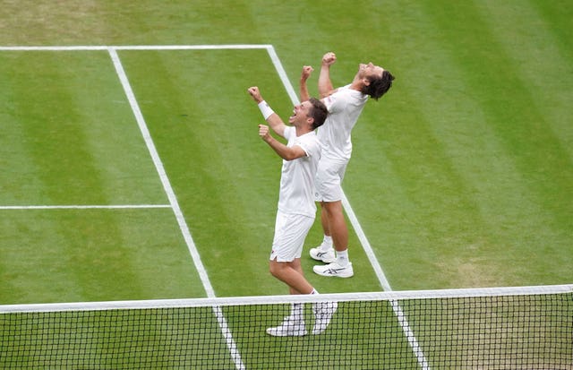 Wesley Koolhoif and Neal Skupski (left) celebrate victory over Marcel Granollers and Horacio Zeballos in the men's doubles final