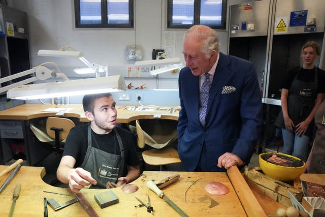 Charles, right, meets young people on The Goldsmiths’ Centre’s Foundation and Goldsmiths’ Company Apprenticeship programmes