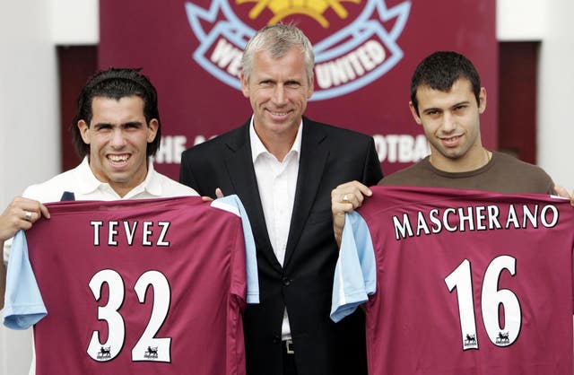 West Ham manager Alan Pardew unveils new signings Carlos Tevez, left, and Javier Mascherano
