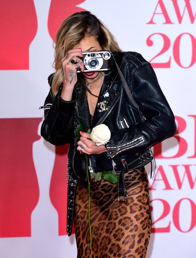 Model Alice Dellal turned the tables on the photographers (Ian West/PA)