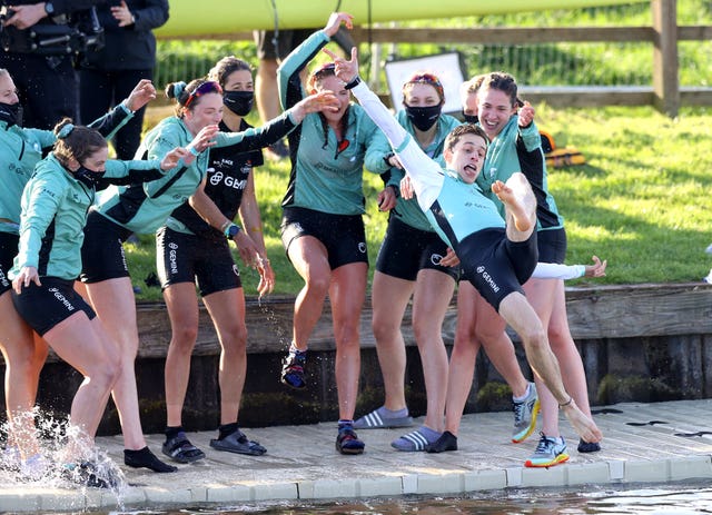 Cambridge celebrate their win (Naomi Baker/PA)