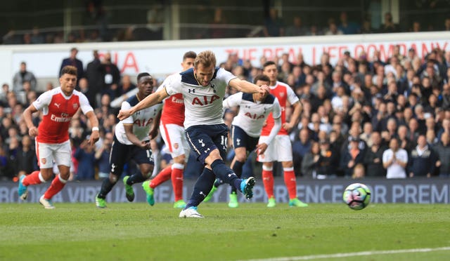 Tottenham's Harry Kane scores a penalty against Arsenal