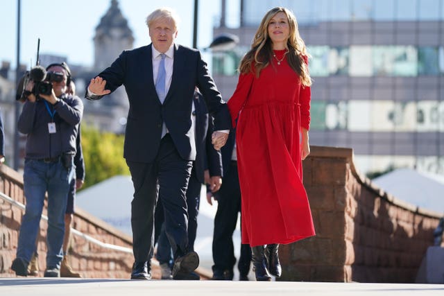 Boris Johnson arriving with his wife Carrie to deliver his speech