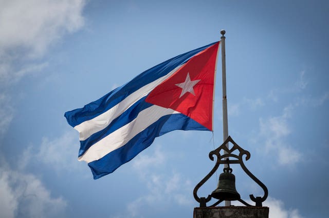 The Cuban flag flies above Old Havana, Cuba