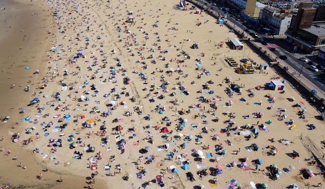 A view of a busy beach in Margate, Kent during a heatwave 