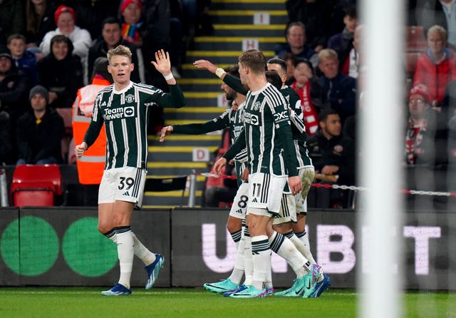 Manchester United’s Scott McTominay (left) celebrates his opening goal 