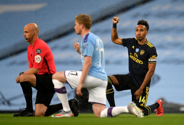 Players and officials at Manchester City-Arsenal and Aston Villa-Sheffield United took a knee prior to kick-off (Peter Powell/NMC Pool/)