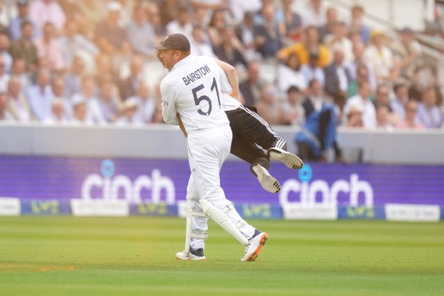 Bairstow lifts a protester