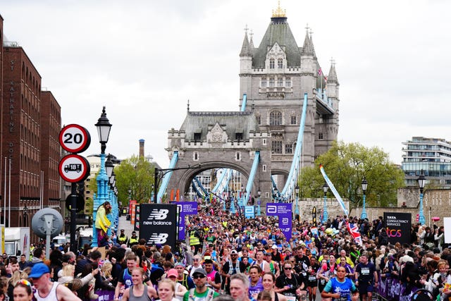 Runners cross Tower Bridge during the London Marathon.