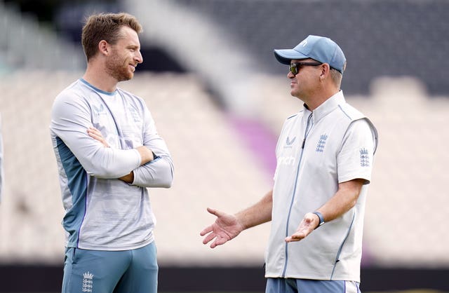 England white-ball head coach Matthew Mott, right, speaks with captain Jos Buttler