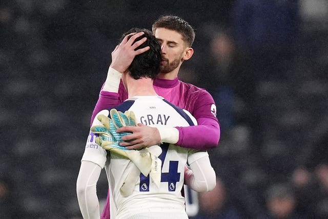 Tottenham Hotspur goalkeeper Guglielmo Vicario and Archie Gray embrace after the Newcastle defeat