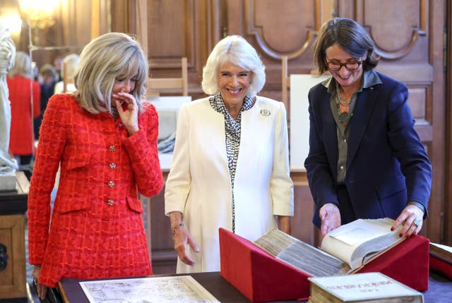 Brigitte Macron, left, and Queen Camilla with president of the French National Library, Laurence Engel, ahead of the launch of a new UK-France literary prize, the Entente Litteraire Prize, during a reception at the Bibliotheque Nationale de France in Paris