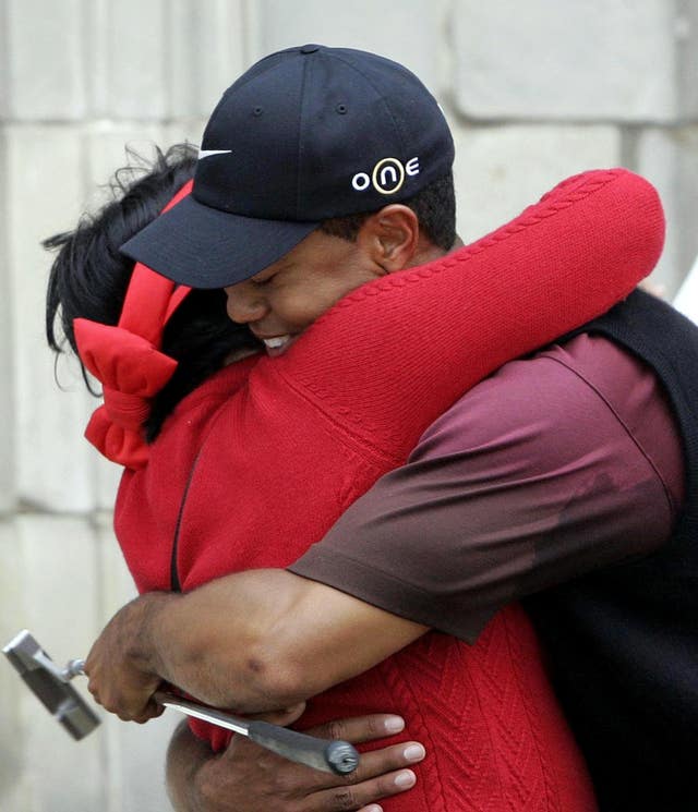 Tiger Woods embraces his mother Kultida