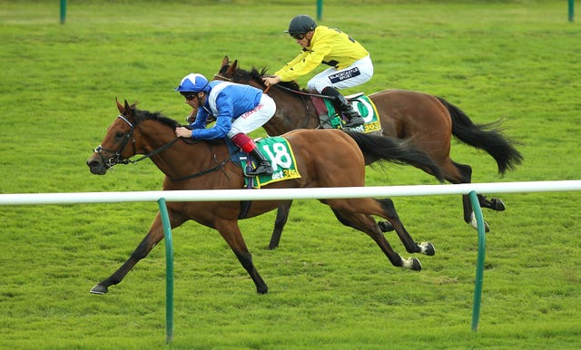 Lord North and Frankie Dettori (left) had matters in hand as they eased to victory in the Cambridgeshire