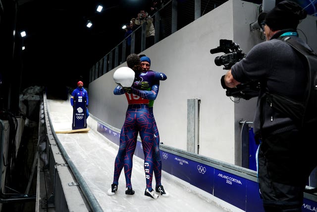 Matt Weston and Tabitha Stoecker celebrate 