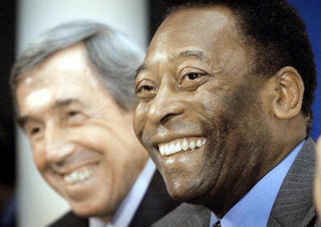 Pele, pictured alongside former England goalkeeper Gordon Banks (left), has dismissed rumours he has been suffering from depression