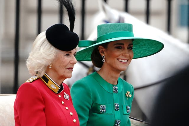 Queen Camilla and the Princess of Wales wore red and green in honour of their regiments 