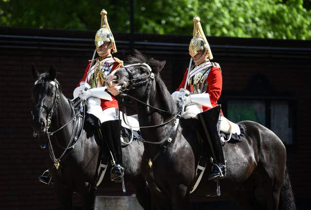 Members of the Household Cavalry ready for inspection in the Regimental Square at Hyde Park Barracks (Kirsty O’Connor/PA)