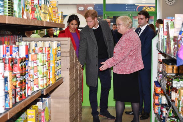 The Duke and Duchess of Sussex are shown around the supermarket 