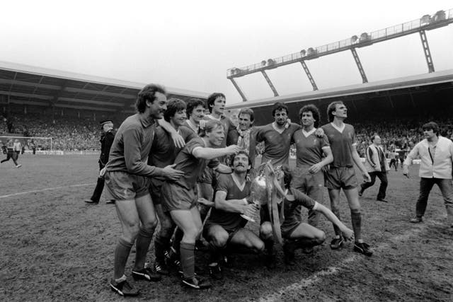 Liverpool celebrate with the 1981/1982 League Championship trophy. (PA Photos)