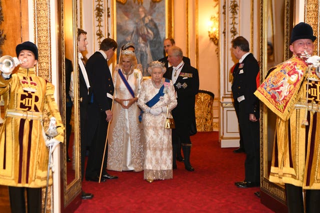 The Queen, the Prince of Wales and the Duchess of Cornwall and the Duke and Duchess of Cambridge attend an evening reception for members of the Diplomatic Corps at Buckingham Palace