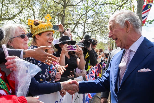 The King on a walkabout outside Buckingham Palace (Toby Melville/PA)