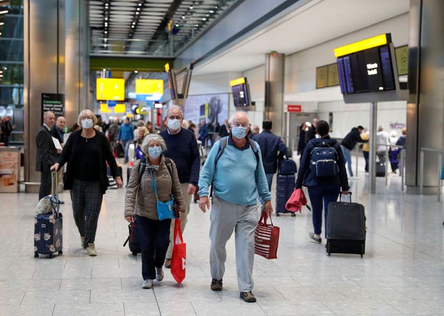 Passengers from the Covid-19-stricken Braemar cruise ship return to Heathrow Airport in London 