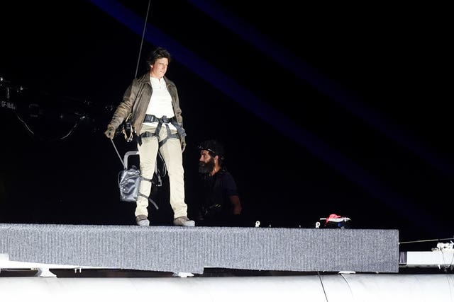 Tom Cruise on the stadium roof during the closing ceremony of the 2024 Paris Olympic Games