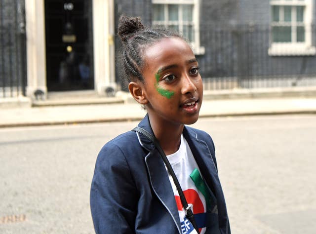 Children posed for photos outside 10 Downing Street ahead of the private reception (Victoria Jones/PA)