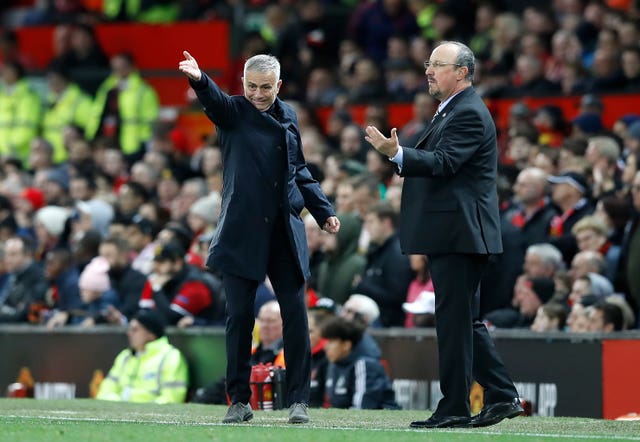Jose Mourinho, left,  alongside Newcastle United manager Rafael Benitez