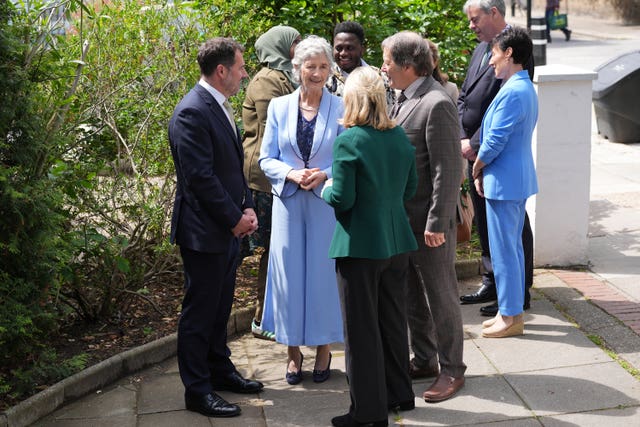 Irish President Catherine Connolly, second left, at the London Irish Centre in Camden, north London