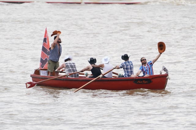 Six men in a rowing boat