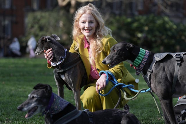 Green MP for Gorton and Denton Hannah Spencer with some of her four greyhounds