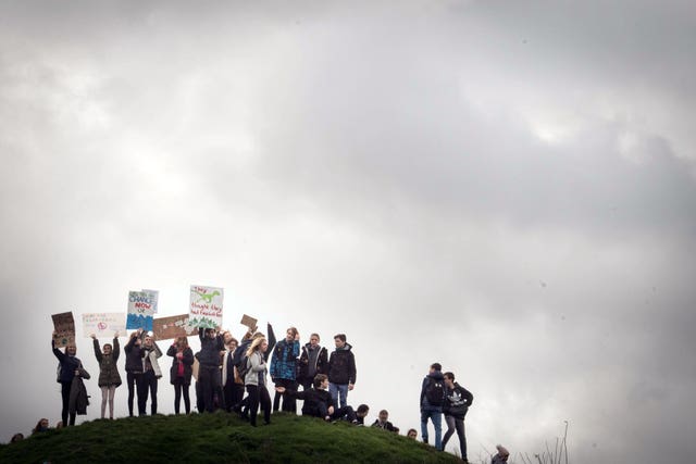 Students take part in the climate change protest in Cambridge (Stefan Rousseau/PA)