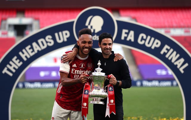 Pierre-Emerick Aubameyang (left) and manager Mikel Arteta celebrate with the FA Cup