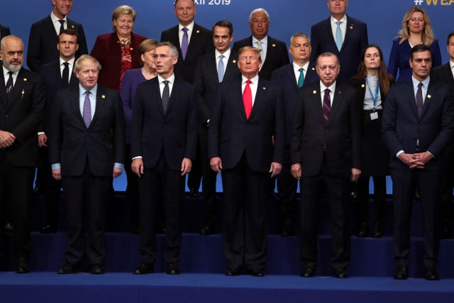 Nato leaders pose for a photograph during the annual summit 
