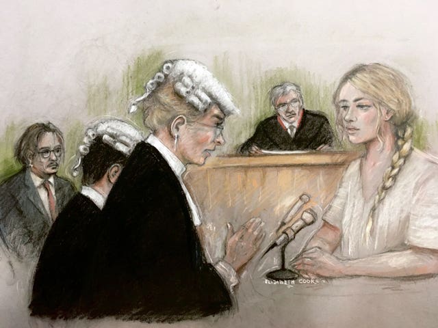 Court artist sketch by Elizabeth Cook of actress Amber Heard being questioned by Sasha Wass QC as she gives evidence at the High Court in London during a hearing in Johnny Depp’s libel case against the publishers of The Sun and its executive editor, Dan Wootton