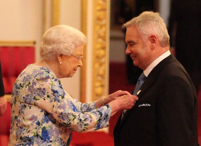 Eamonn Holmes receives his honour from the Queen