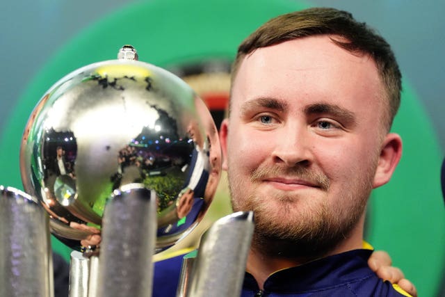 Luke Littler with The Sid Waddell Trophy after winning the World Darts Championship in January
