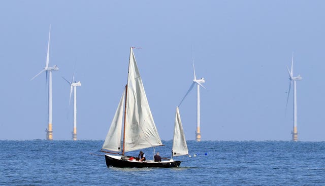 A sailing boat passes the Kentish Flats Offshore Wind Farm (Gareth Fuller/PA)