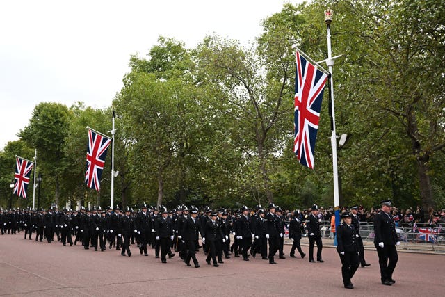 Police officers prepare on The Mall in London ahead of the Queen's state funeral