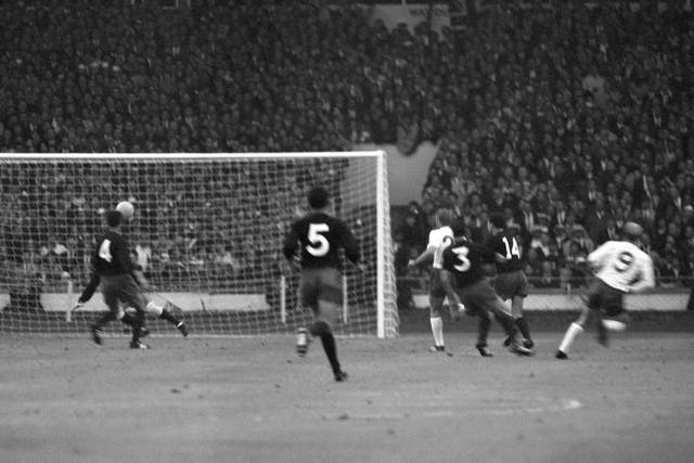 Sir Bobby Charlton watches as his shot flies past Mexico goalkeeper Ignacio Calderon