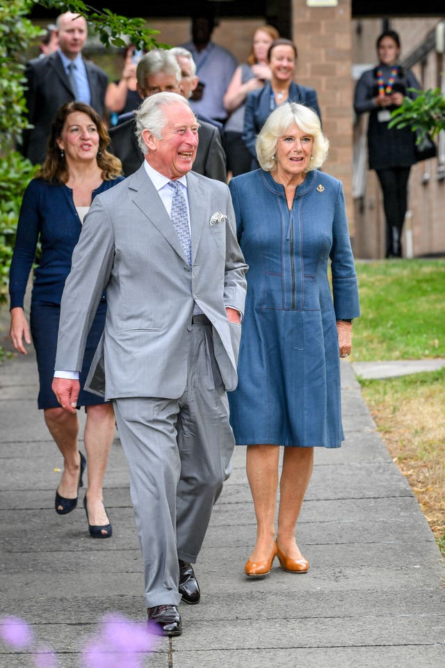 The Prince of Wales and the Duchess of Cornwall arrive at Gloucestershire Royal Hospital