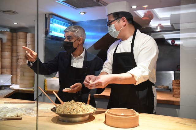 Mayor of London Sadiq Khan making dumplings with head chef Lin Bing during a visit to Dumplings’ Legend in China Town, London (Kirsty O'Connor/PA)