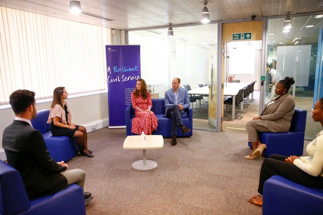 The Duke and Duchess of Cambridge speaking to people who found work during a visit to the London Bridge Jobcentre 