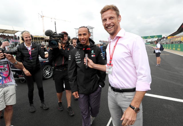 Jenson Button (right) questioned Ferrari's tactics 